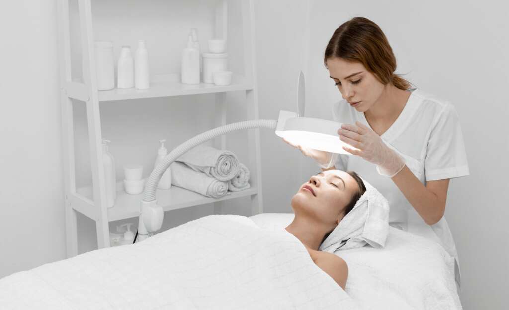 A facial treatment being carried out